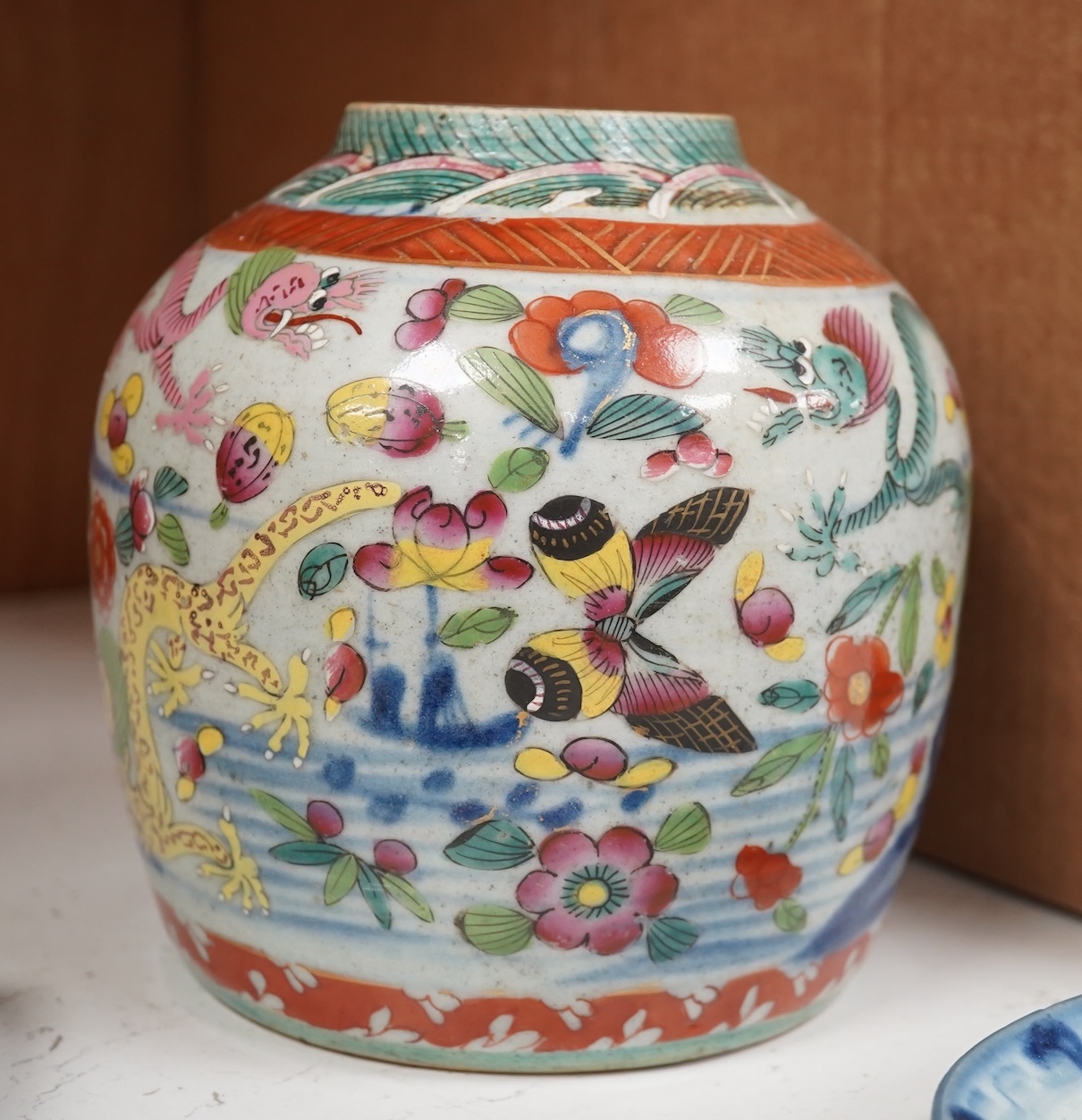 A Chinese famille rose vase, together with a Japanese Imari plate and two others, largest 16cm high. Condition - poor to fair